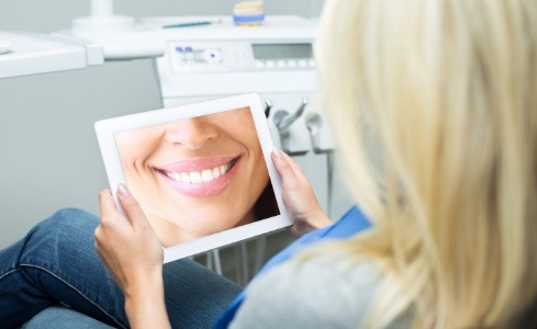 Woman looking at digital smile design