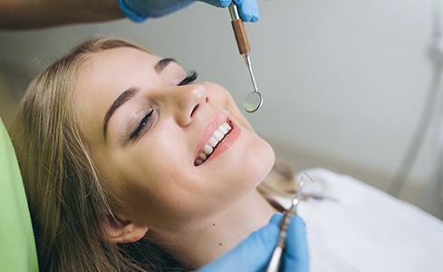 Dental patient receiving fluoride treatment