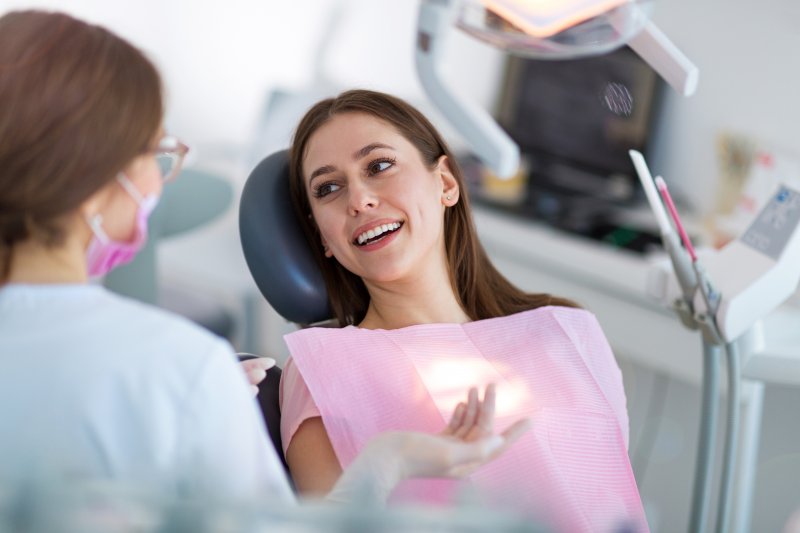 Woman smiling in the dental chair